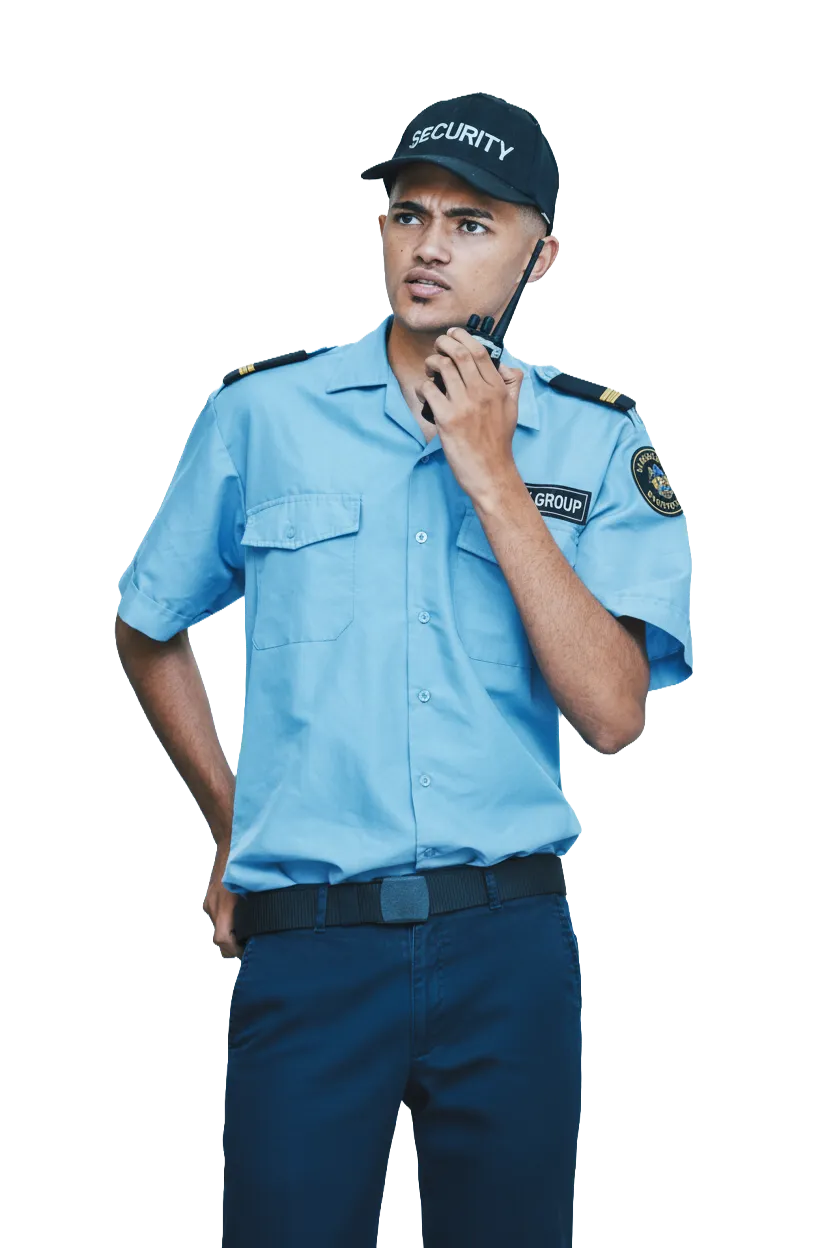 Uniformed security guard assisting visitor at reception